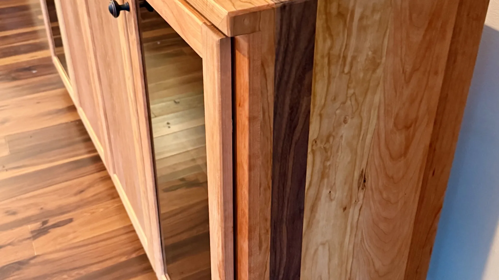 Cherry and walnut sideboard buffet cabinet with glass-front doors